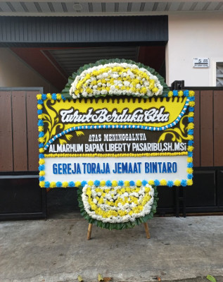 Papan Bunga Duka di Anggalomelai